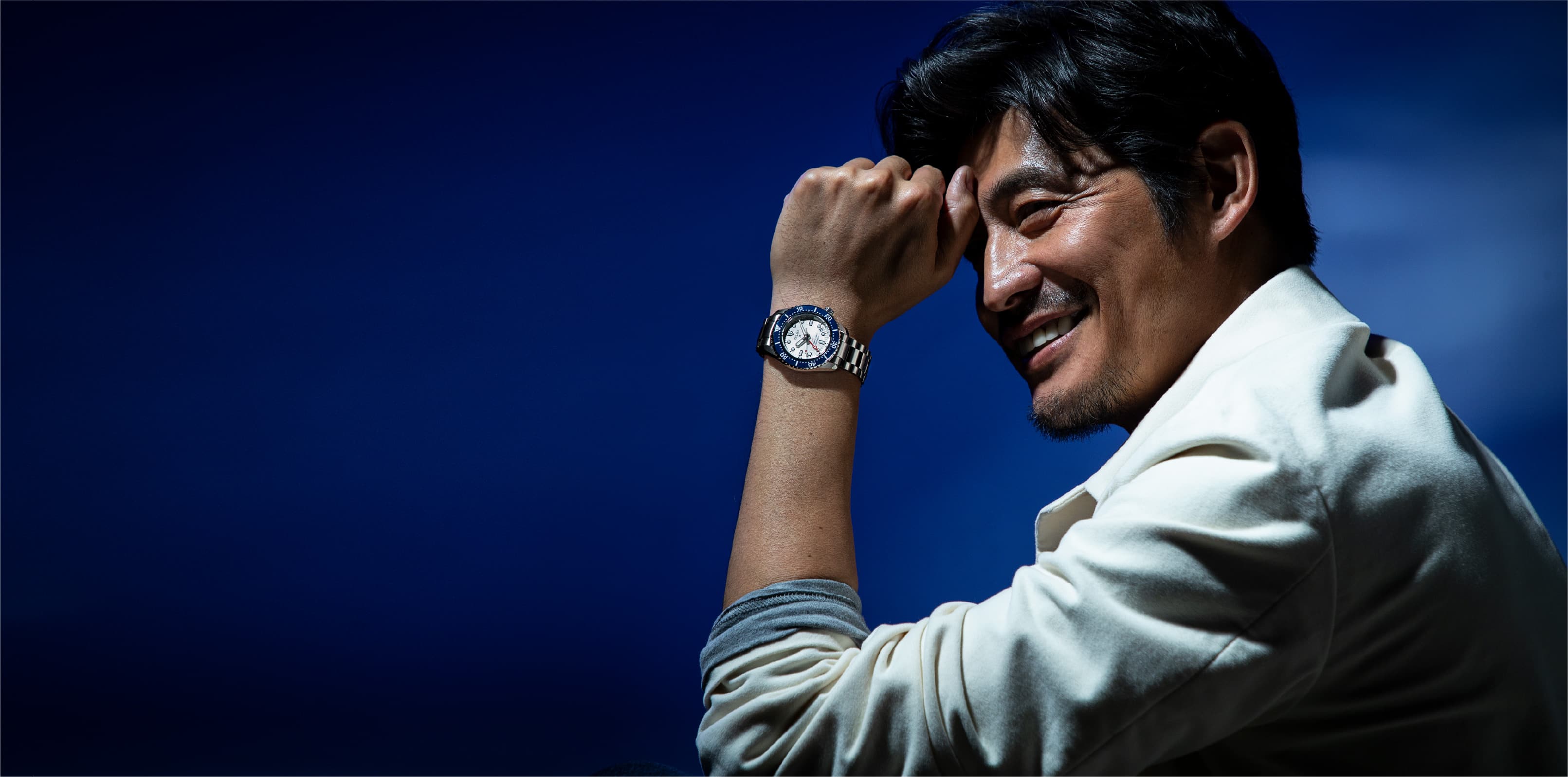 写真：坂口憲二