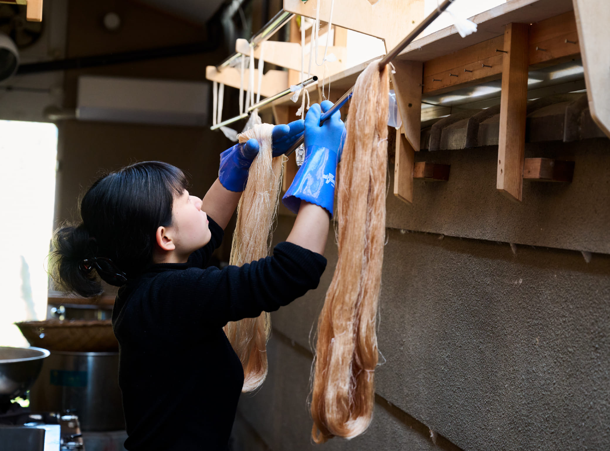 Photo of The dyed silk is then wrung out